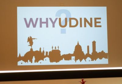 Close-up of a projector screen showing branded content.