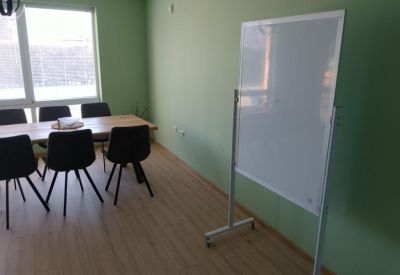 Meeting area with table and whiteboard