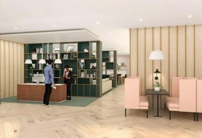 Spacious contemporary lobby and reception area at 8, Leake Street with warm wood paneling and pink booth seating.