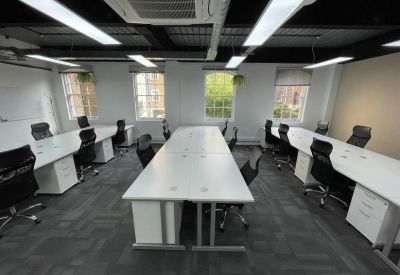 Modern open-plan workspace with white desks and black chairs, 2 Bath Place, Shoreditch, London