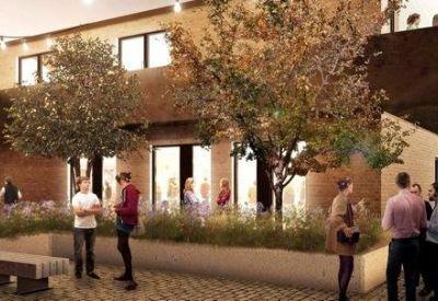 Communal outdoor courtyard with seating, trees, and people socializing.