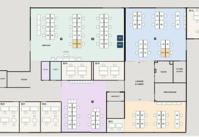 Detailed color-coded floor plan showing the layout of various office suites and common areas.