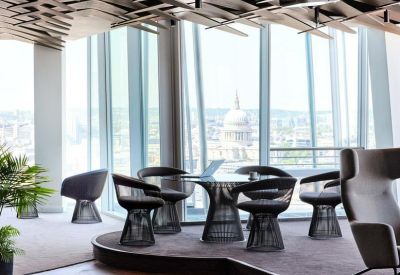 Stylish breakout lounge with designer seating and a view of St Paul's Cathedral.