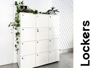 Bank of white storage lockers topped with trailing green vines.