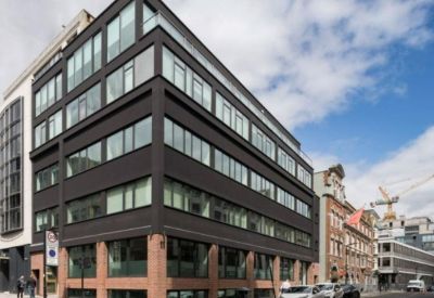 Modern black and brick exterior of the Paul Street, London, United Kingdom office building.