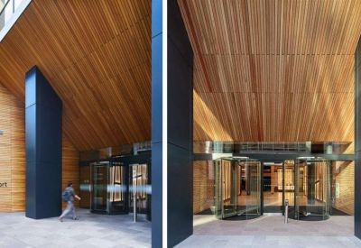 Wood-paneled entrance with revolving doors at Republic, 2 Clove Crescent, London E14 2BE.