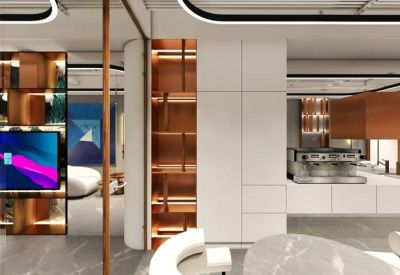 Modern office breakout space with a large media screen, built-in shelving, and a coffee station.