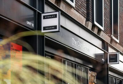 Close-up of building signage for The ClassRooms at Stanley Square.