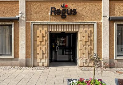 Exterior entrance of Storgatan 17, Kalmar, Sweden with Regus signage above the door.
