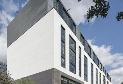 Exterior view of the contemporary white and charcoal facade of Wenlock Works.