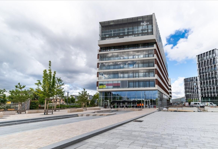 Modern multi-story exterior facade at 1, Esplanade Miriam Makeba, Villeurbanne.