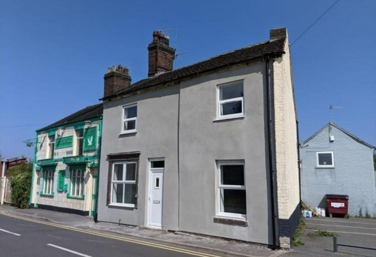Exterior view of the two-story building at 111 Newport lane stoke-on-trent.