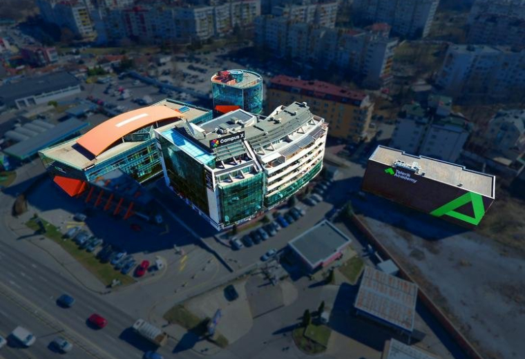 High-angle exterior view of the modern, glass-fronted building at 31 Alexander Malinov Boulevard.