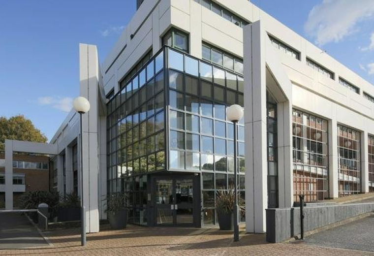 Exterior view of the contemporary white and glass facade at 470 Bath Road, Bristol.