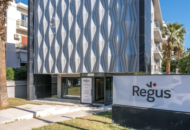 Exterior view of the uniquely textured facade of the Grigoriou Lampraki 58, Glyfada building.