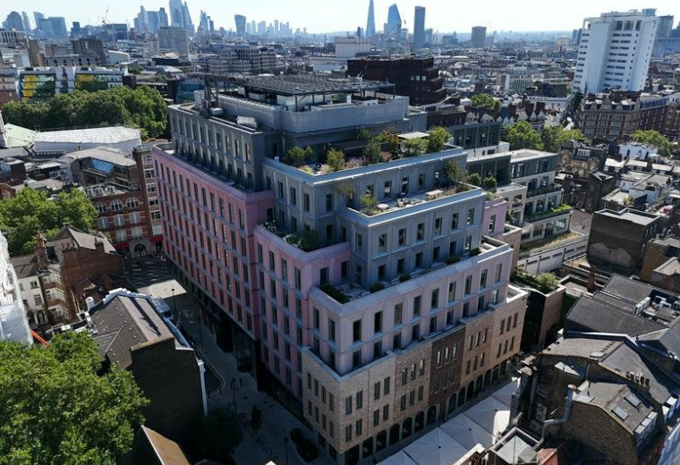 Aerial view of the colorful stepped facade at Ilona Rose House in London.