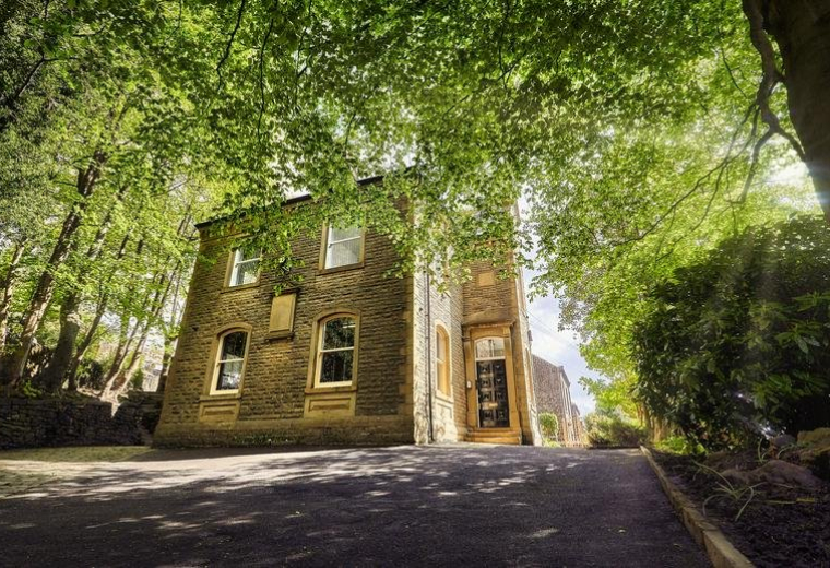 Exterior view of the stone building at Lewisham Road, Slaithwaite, Huddersfield, West Yorkshire.