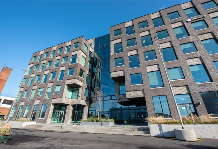 Modern multi-story brick and glass exterior at Nordenskiöldsgatan 11, Malmo.