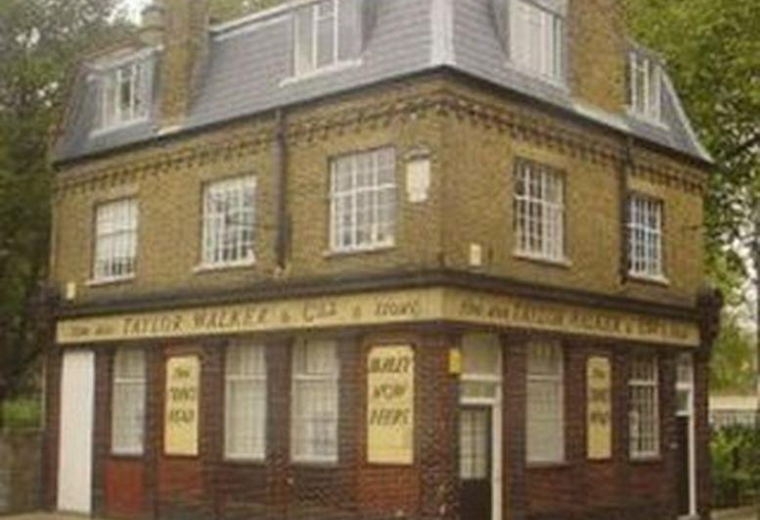 Exterior view of the historic brick building at 1 Green Bank.