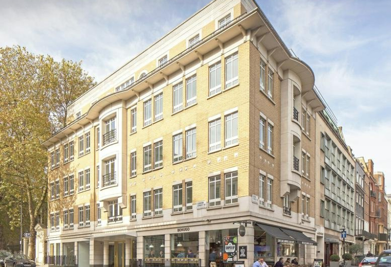 Exterior view of the classic corner building at 14 Curzon Street.