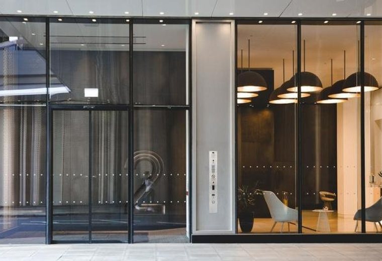 Ground floor glass entrance and lobby at 2 Stephen Street, Central London.