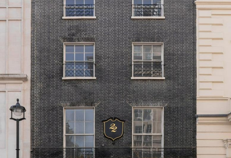 Exterior facade of the dark brick building at 22, Kingly Street.