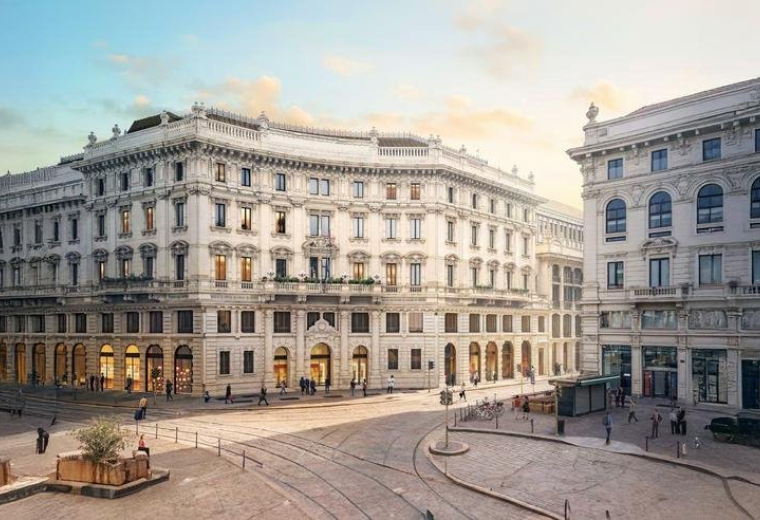 Exterior view of The Medelan building showing classic architecture and plaza.