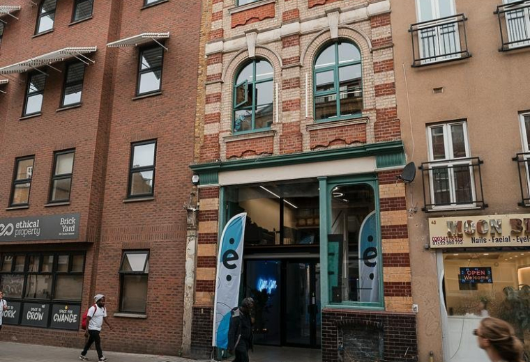 Exterior view of the brick and glass facade at 41, Pitfield Street.