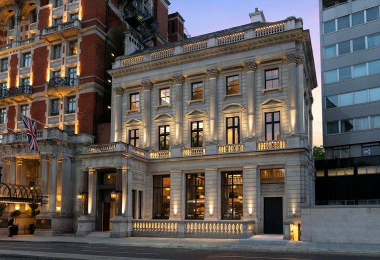 Grand stone facade of 64 Knightsbridge, Central London, SW1X (Opposite Harvey Nichols).