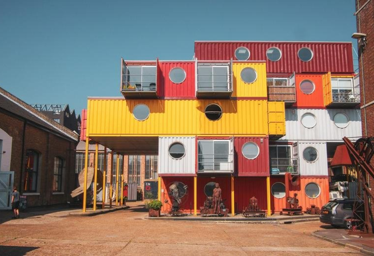 Exterior view of the colorful container building at 64, Orchard Place, Trinity Buoy Wharf.