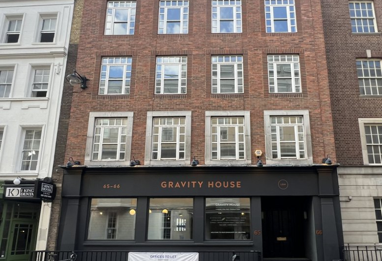 Exterior view of the brick facade and entrance of Gravity House at 65-66, Frith Street.