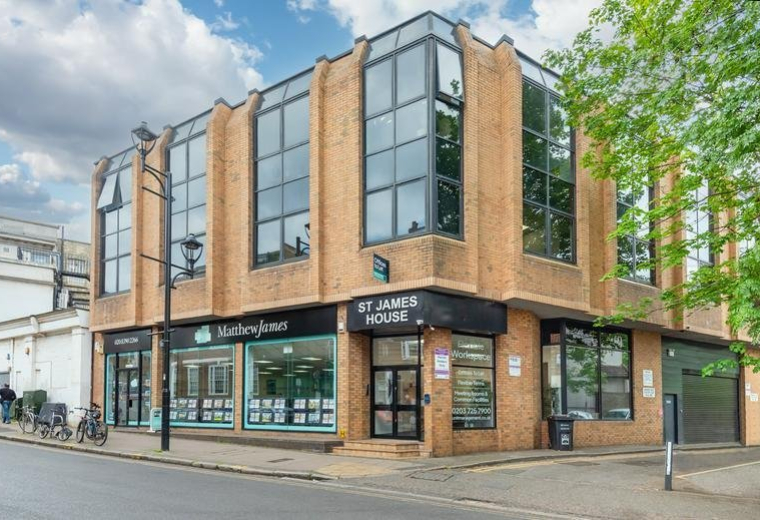 Exterior facade of the brick and glass St James House at 9 St James' Road.