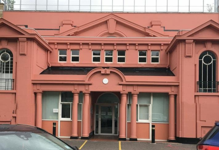Exterior view of the ornate pink facade at Eurolink Business Centre, 49 Effra Road, Brixton.