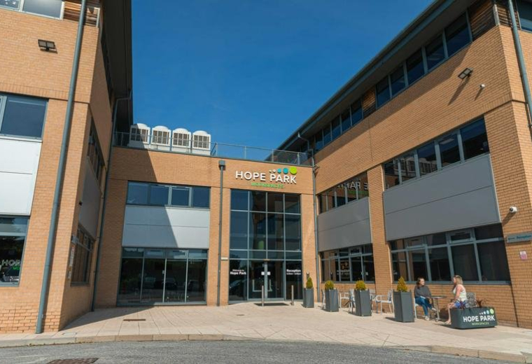 Exterior view of the brick facade and entrance at Hope Park, 15 Trevor Foster way.