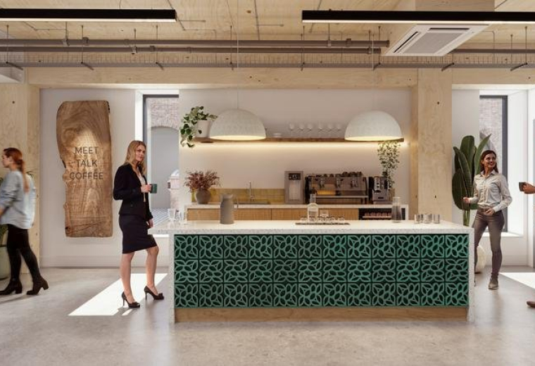 Modern communal kitchen at Old Paradise St, London, UK, 30-34 with a teal tiled island and pendant lighting.
