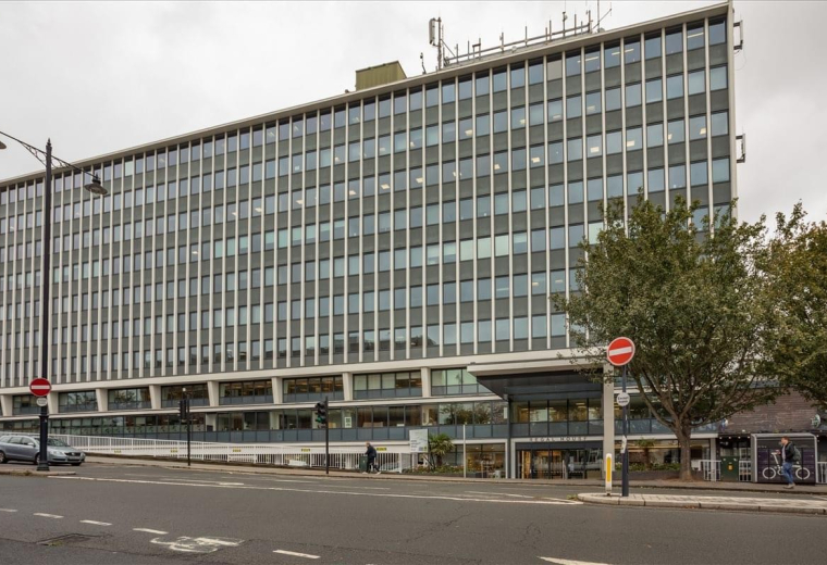The expansive glass facade and modern exterior of Regal House, 70 London Road, Twickenham.