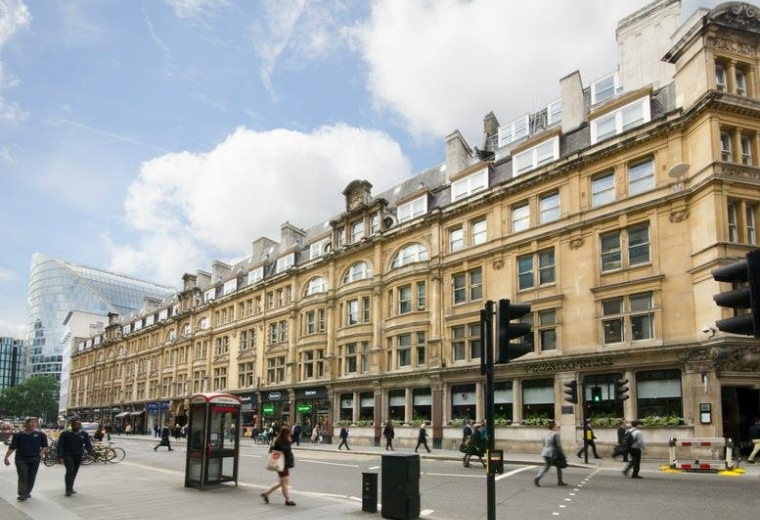 Grand stone exterior of Salisbury House, Finsbury Circus with classic architectural detailing and street level shops.