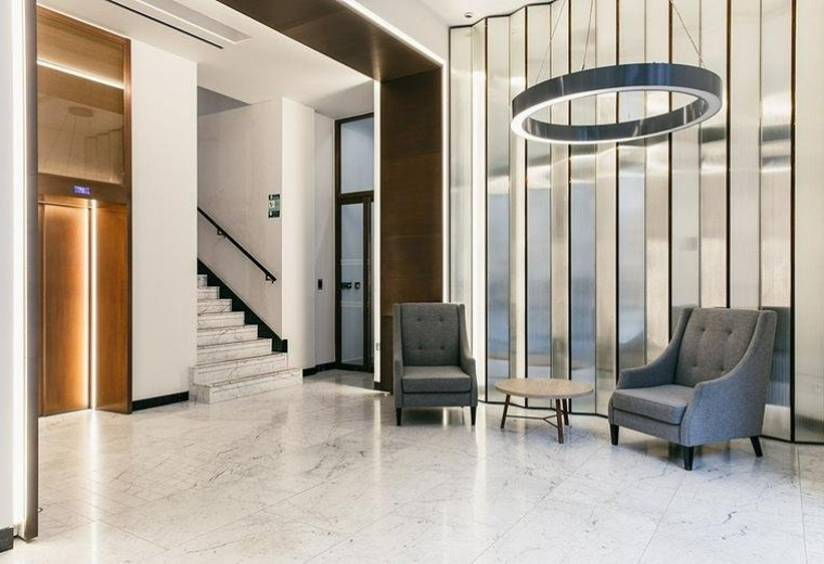 Modern marble-floored lobby at The Hallmark Building, 52-56 Leadenhall Street, London.