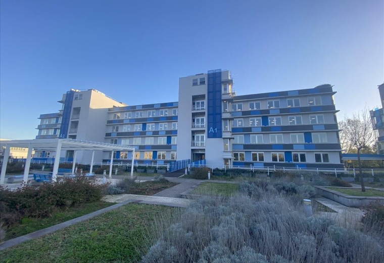 Exterior view of the modern multi-story office building at Via Rivoltana 2d, Segrate.