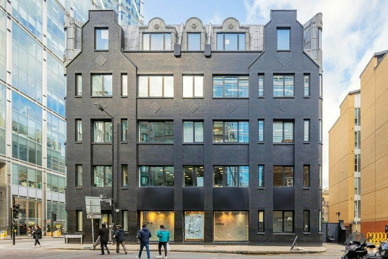 Exterior view of the dark brick facade at 1, Norton Folgate in London.