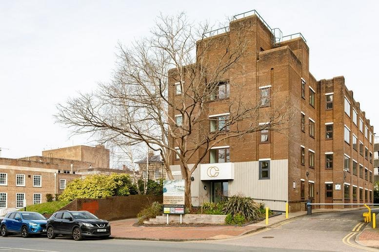 Exterior view of the brick facade and entrance at 11-12 Crescent Road.
