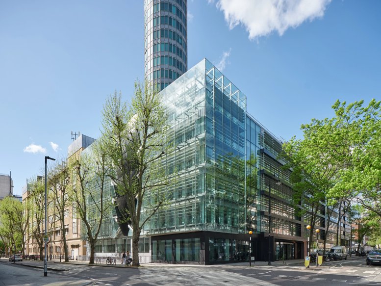Exterior view of the modern glass-facade building at 15 Fitzroy Street.