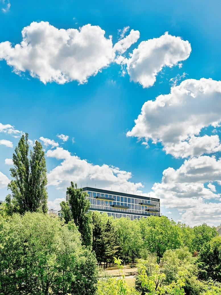 Exterior view of the contemporary glass facade building at 23, Obere Donaustraße, 23-29.