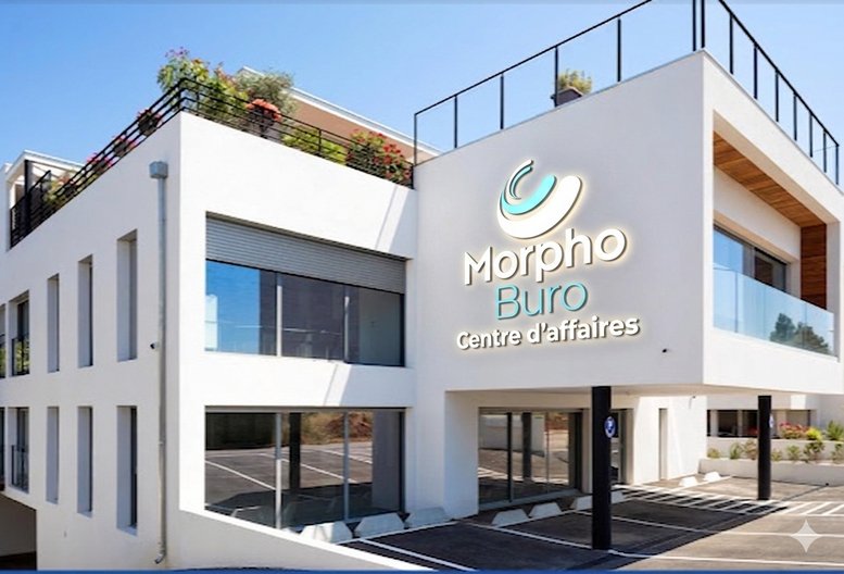 Modern white exterior building facade of 2390, Route des Milles,MORPHOBURO with rooftop greenery.
