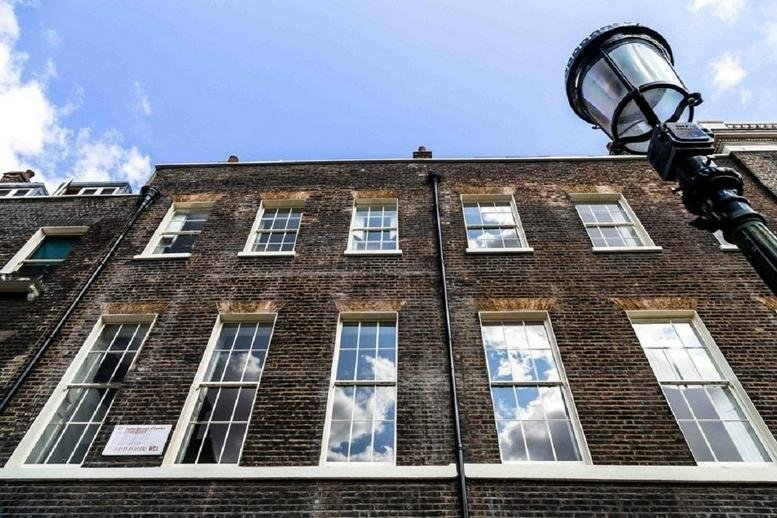 Exterior view of the historic brick facade at 26/27 Bedford Square, Central London, WC1B.