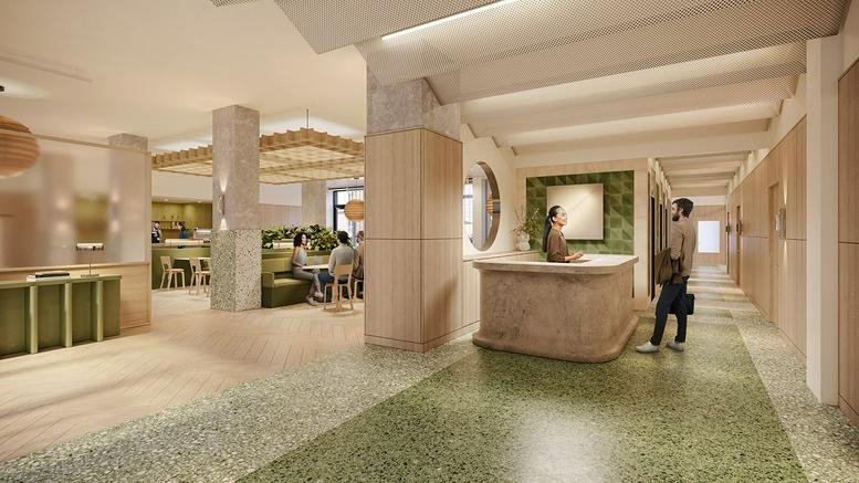 Spacious reception area at 3-7 Langham Place with a curved stone desk and green terrazzo flooring.