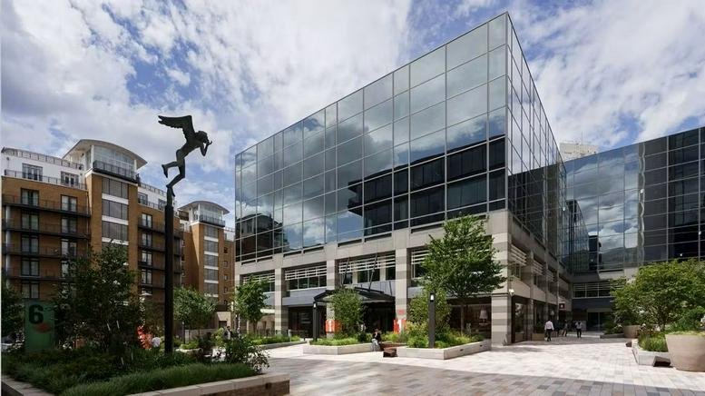 Exterior view of the modern glass-facade building at 4 Thomas More Street, Building 1.