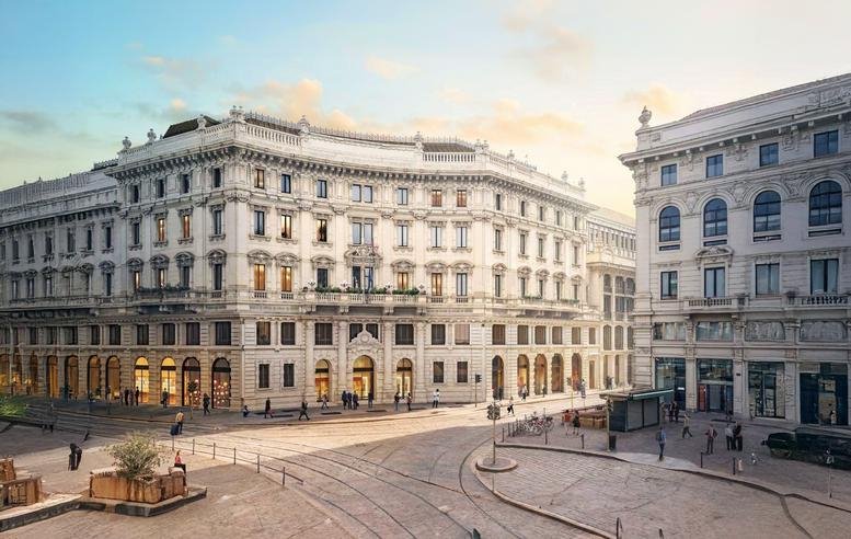 Exterior view of The Medelan building showing classic architecture and plaza.