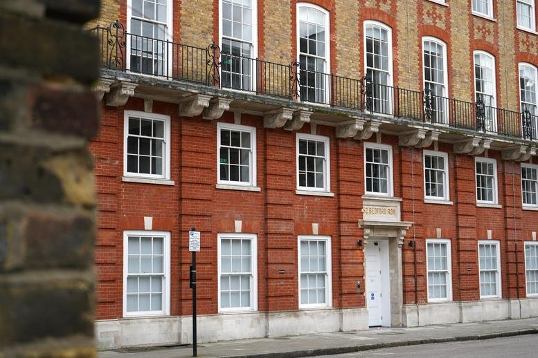 Exterior view of the traditional red brick facade at 52, Bedford Row.