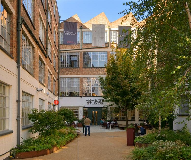Exterior view of the brick industrial facade and courtyard at 53-79, 53-79, Highgate Road.